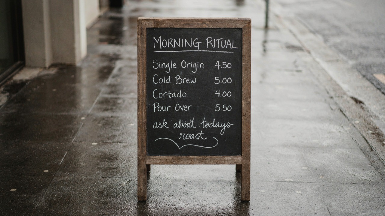 P-Image-Ideogram output at thinking medium, chalkboard menu with all four prices rendered correctly